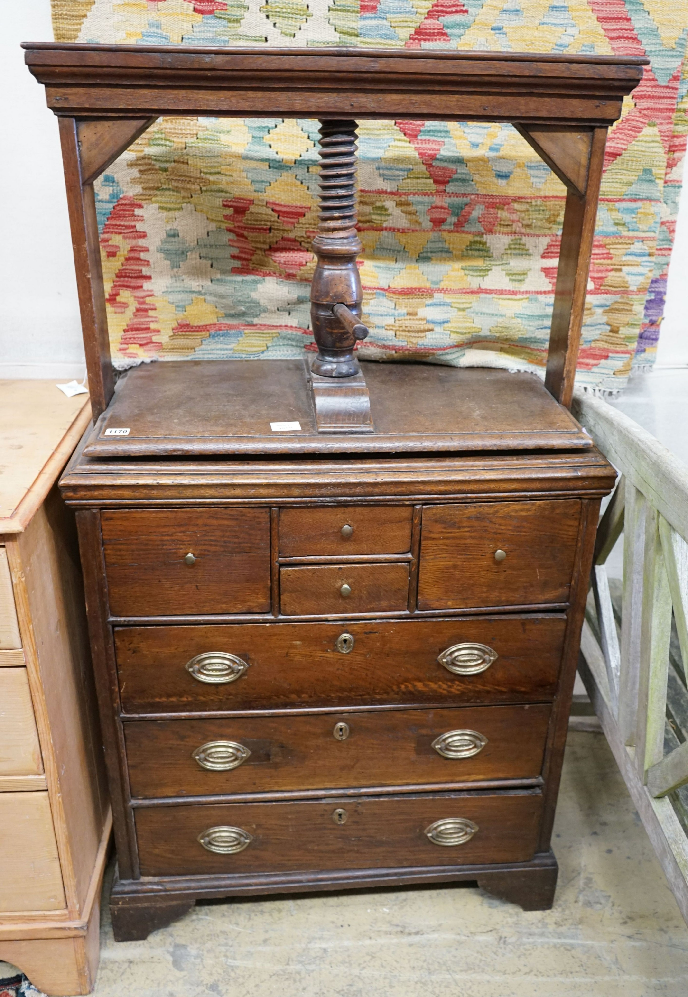 A George III provincial oak linen press, width 76cm, depth 42cm, height 140cm